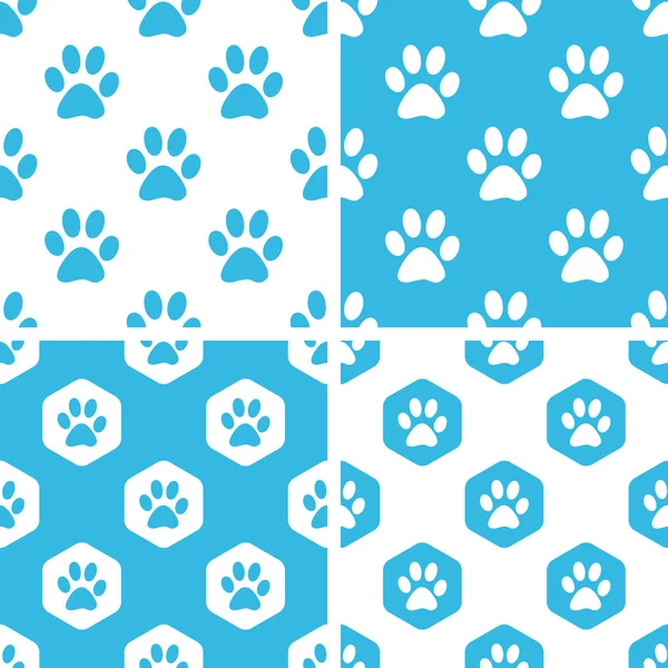 Animal paw patterns set — Stock Vector