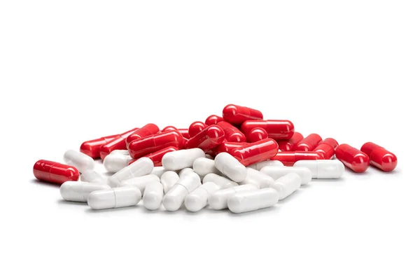 Close Pile Red White Colored Pills Capsules Isolated White Background — Stock Photo, Image