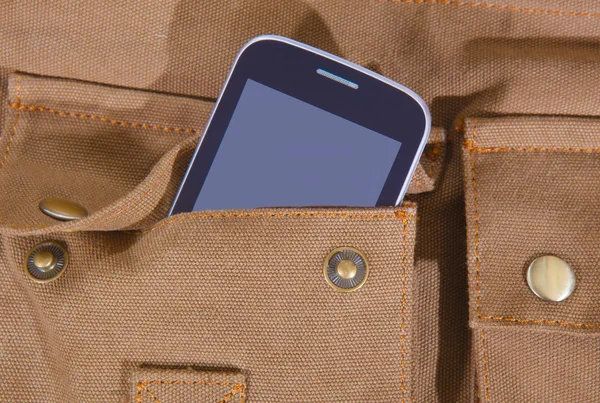 Smartphone v otevřené kapsy sáček — Stock fotografie