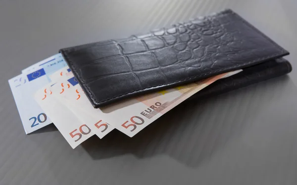 Euro banknotes in leather purse — Stock Photo, Image