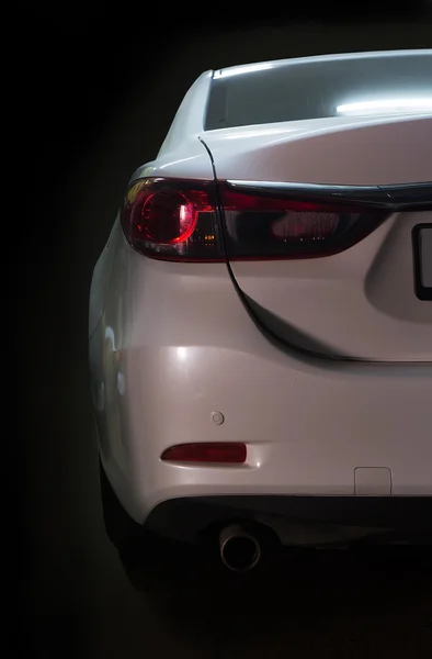 Coche en parches de luz — Foto de Stock