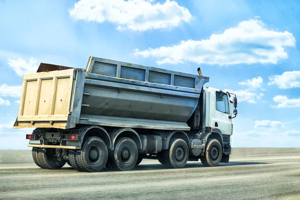 Dump truck goes on highway — Stock Photo, Image