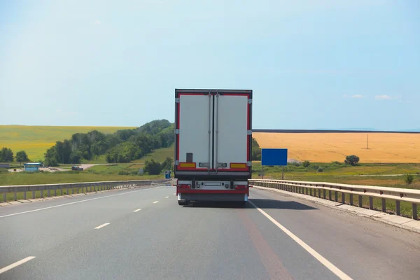 Truck goes on highway — Stock Photo, Image
