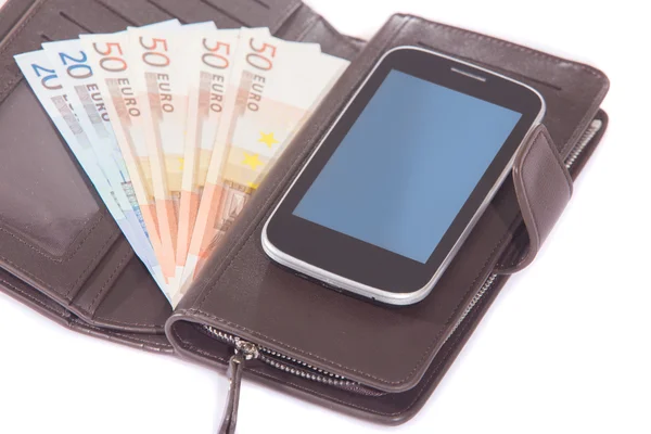 Eurosedlar handväska och smartphone — Stockfoto