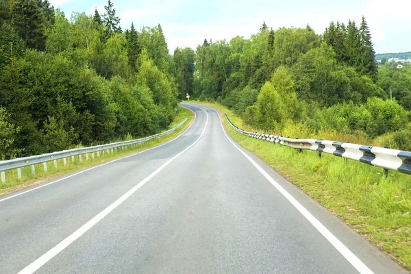 Country highway in wood — Stock Photo, Image