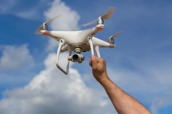 Quadricopter  in male hand — Stock Photo, Image