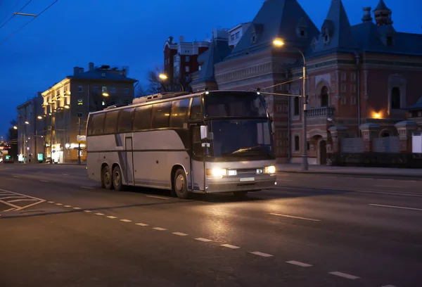 Bus moves in Moscow along the night street