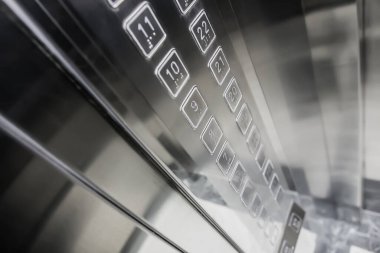 Modern asansörün zemin numarası düğmeleri.