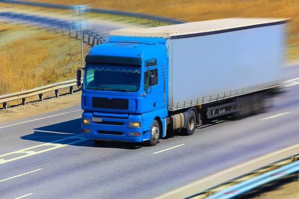 Truck moves on highway — Stock Photo, Image