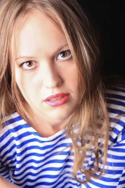 Young woman in striped hoodie Stock Photo