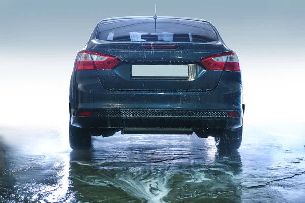 Car covered with foam on car wash — Stock Photo, Image