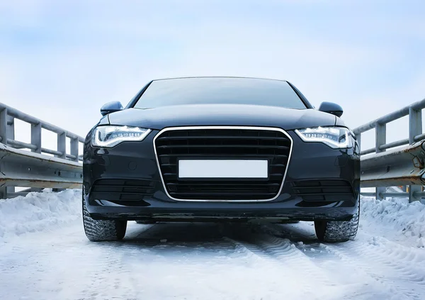 Car in winter on road — Stock Photo, Image