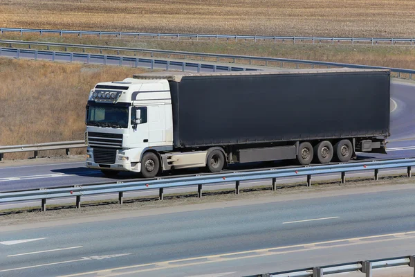 Truck goes on highway — Stock Photo, Image