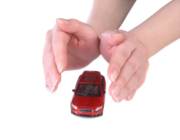 Jouet voiture dans les mains féminines — Photo