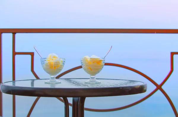 Two ice-cream bowls on table — Stock Photo, Image