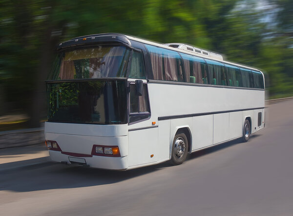 tourist bus goes on the highway