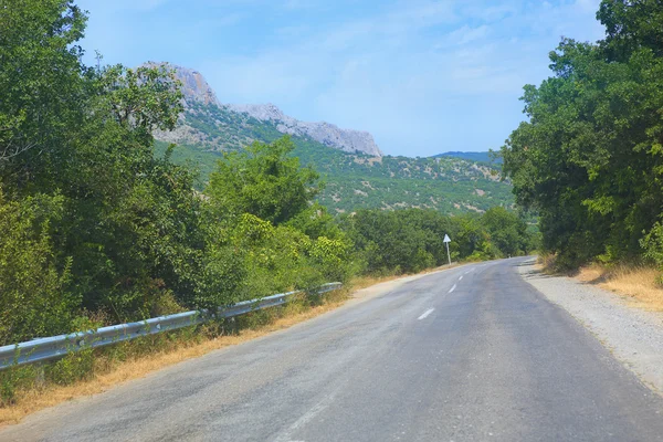 Crimea mountain landscape with highway — Stock Photo, Image