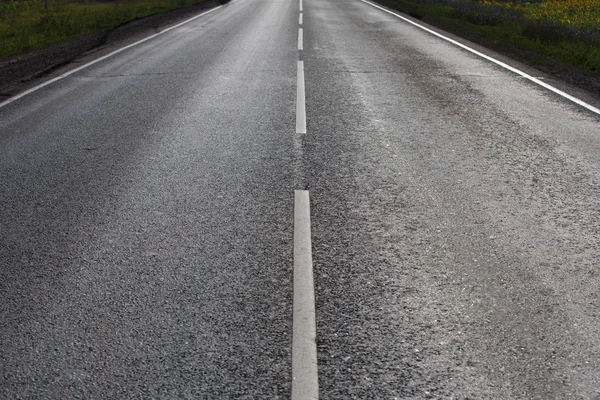 Asfalt bestrating op snelweg — Stockfoto