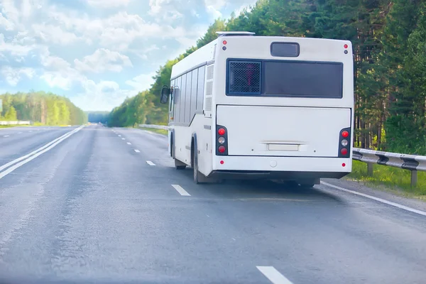 Bus goes on  country highway — Stock Photo, Image