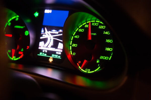 speedometer on dashboard of car