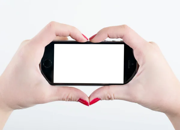 Heart shape hands and blank screen — Stock Photo, Image