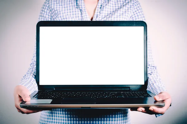 Laptop computer in the female hands — Stock Photo, Image