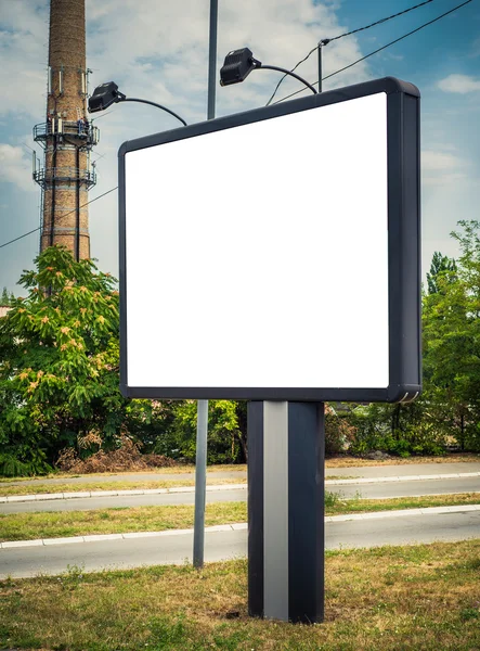 Blank billboard on street — Stock fotografie