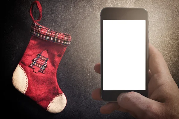 Vánoční ponožka a prázdná obrazovka — Stock fotografie