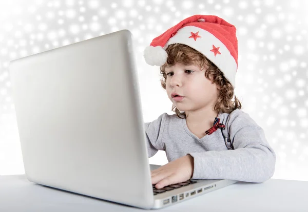 Little child with Santa hat — Stock Photo, Image