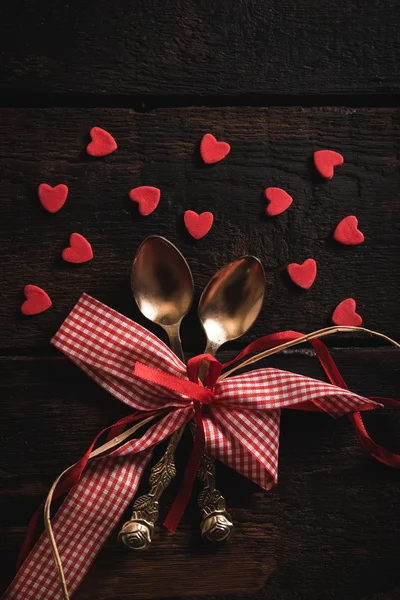 Spoons with Valentine hearts — Stock Photo, Image