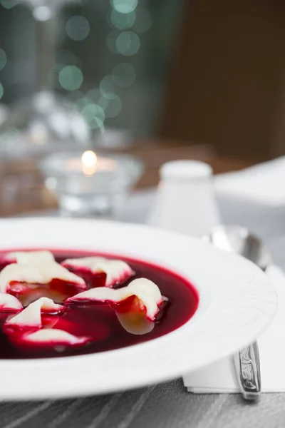 Traditional Polish beetroot soup with dumplings (red borsch) — Stock Photo, Image