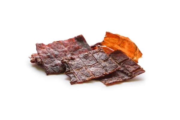 Beef jerky geïsoleerd op een witte studio achtergrond — Stockfoto