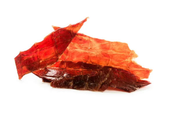 Beef jerky isolated on a white studio background — Stock Photo, Image