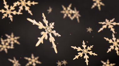 altın arka plan koyu odaklanarak kar taneleri