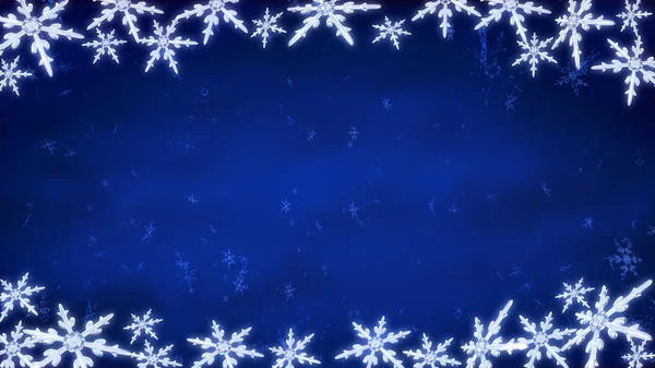 Planche de flocons de neige fond bleu — Photo