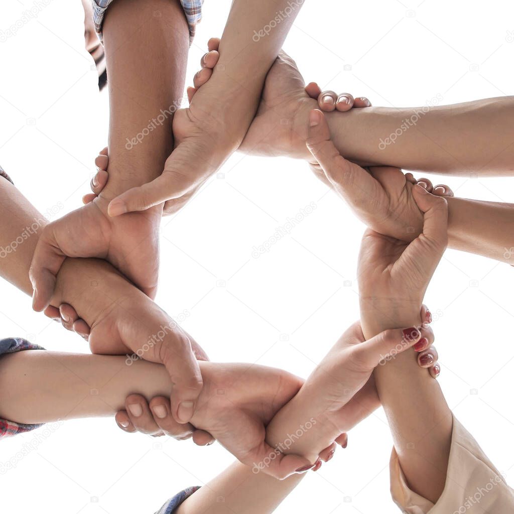 under view friendship People partnership teamwork crossed hands finishing up meeting show unity on white background , Business partner  teamwork concept  