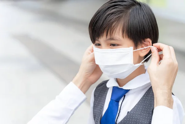 Father Putting Protective Mask His Son Asian Family Wearing Face — Stock Photo, Image