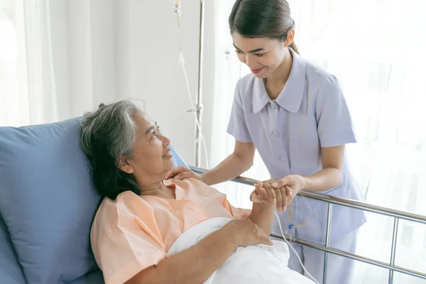 Doctors Hold Hands Encourage Elderly Senior Woman Patients Hospital Senior — Zdjęcie stockowe
