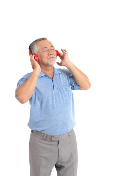 Styl Życia Starszy Mężczyzna Czuje Się Szczęśliwy Słuchając Muzyki Słuchawkami — Zdjęcie stockowe