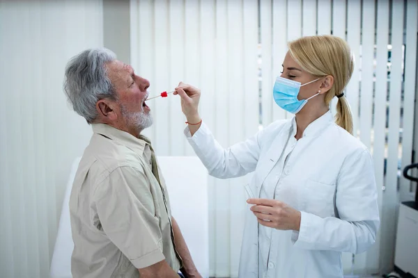 Nurse Taking Pcr Test Elderly Patient Covid Pandemic — Stock Photo, Image