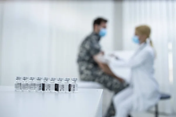 Military Vaccination Immunization Bottles Vaccine Doctor Giving Injection Soldier Uniform — Stock Photo, Image