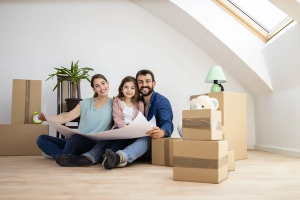 Portrait Happy Young Family Daughter Holding Project Layout New House — Fotografia de Stock