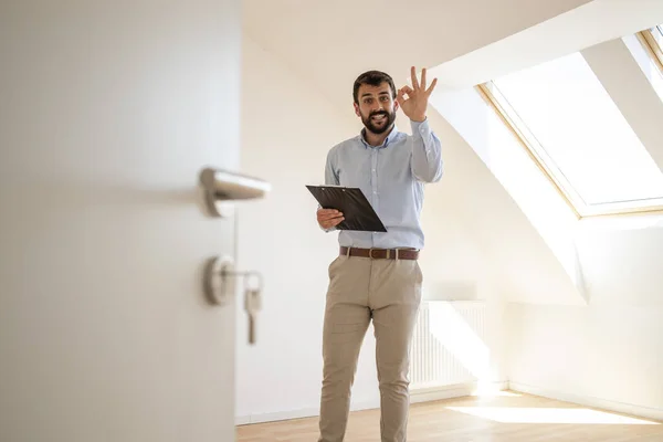 Portrait Handsome Real Estate Agent Holding Okay Gesture Sign New — Stockfoto
