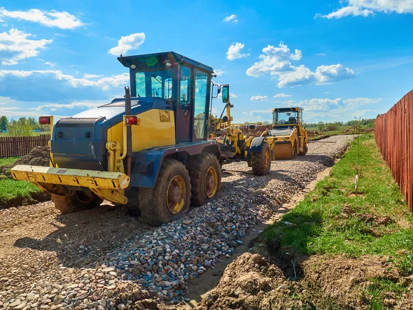 Máquina rodoviária para nivelar o solo — Fotografia de Stock