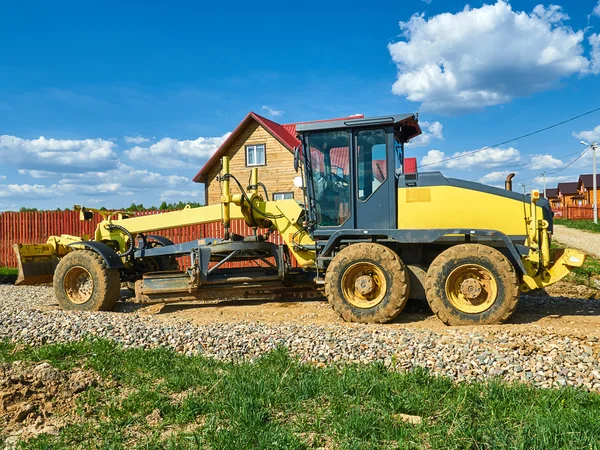 Väg maskin till plan mark — Stockfoto