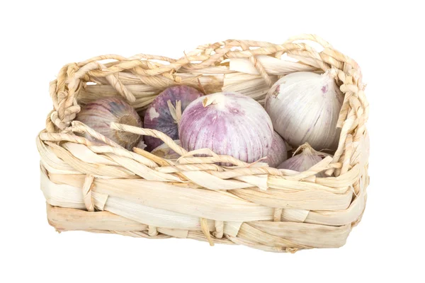 Organic garlic in a small basket — Stock Photo, Image
