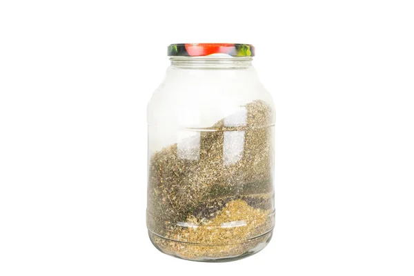 Pot en verre avec des herbes — Photo