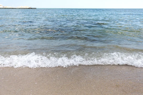 Onda do mar na praia de areia — Fotografia de Stock