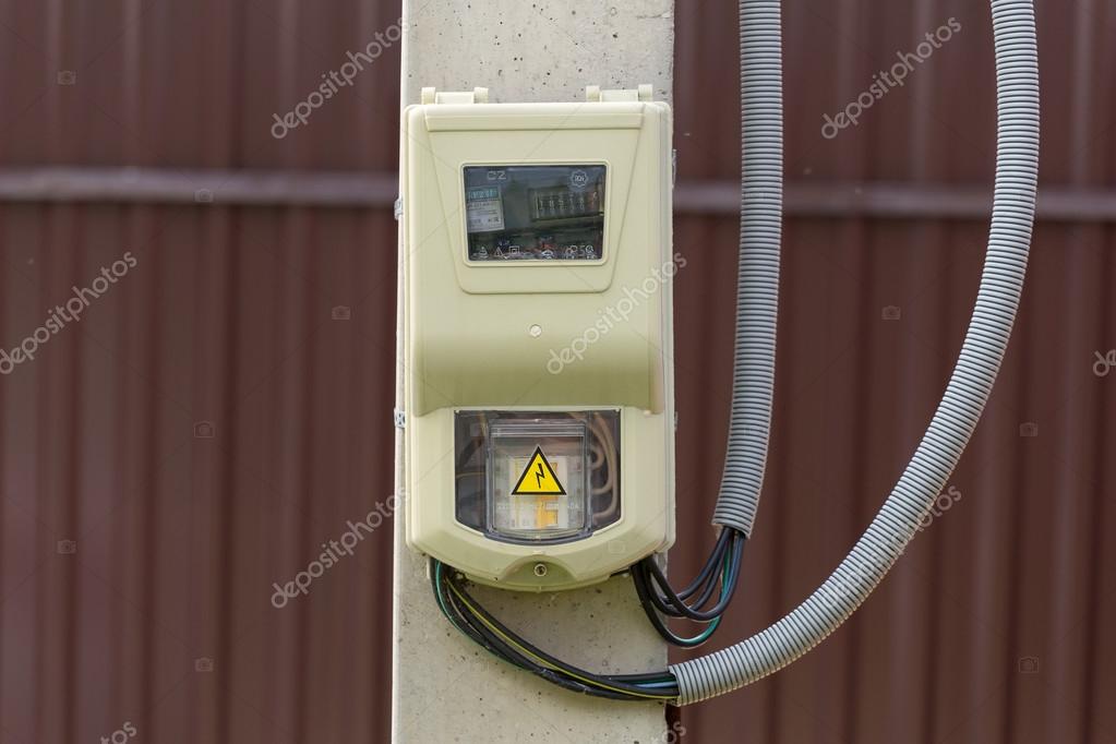Electric meter on a pole — Stock Photo © realperson2 82483036