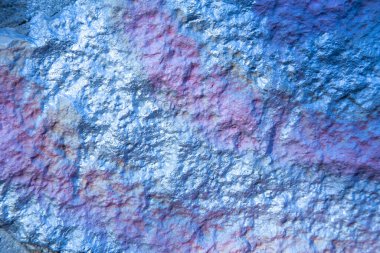 Gümüş ve pembe boya ile boyanmış taş dokusu